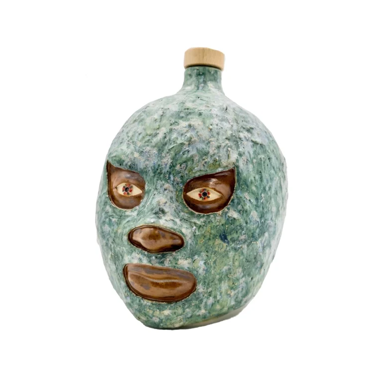 El insolente, escultura de Felipe Martí en cerámica de alta temperatura con rostro expresivo y acabado texturizado.